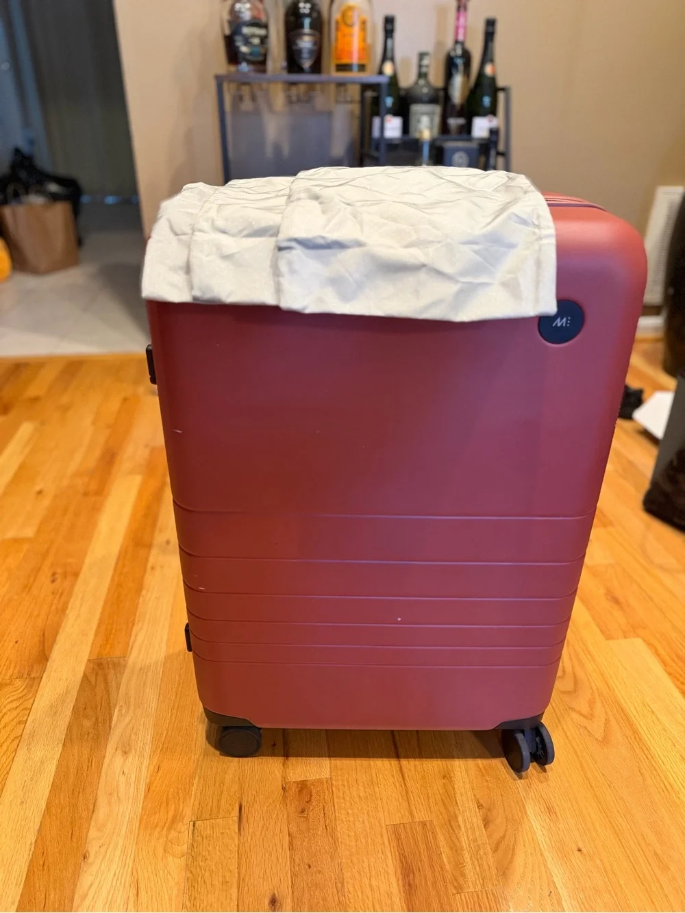 Monos medium check in 24” terracotta color suitcase LIKE NEW